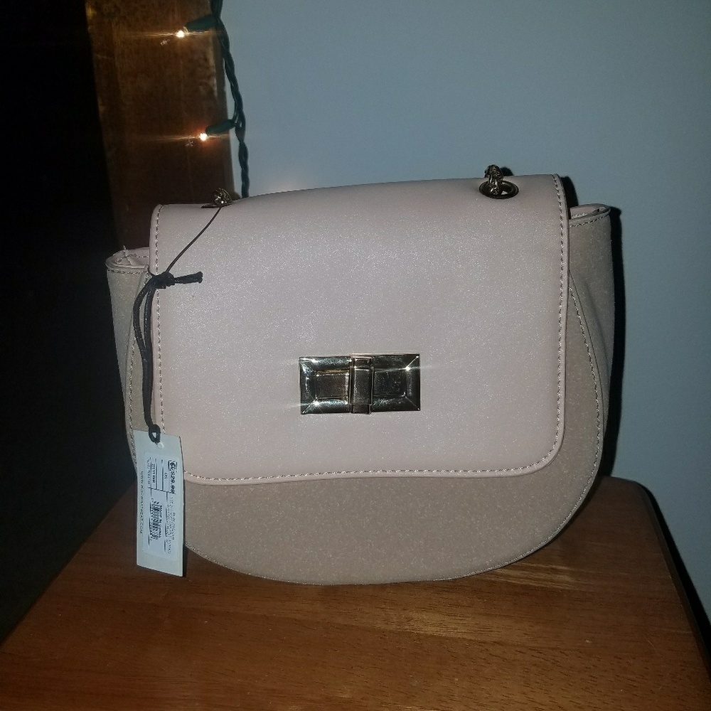 Small pink and tan purse with gold chain strap
